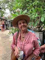 Patti Middleton (older woman wearing a straw hat)