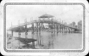 black and white photo of historic pedestrian bridge