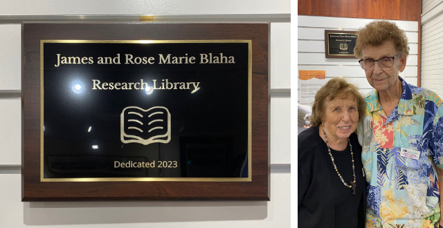 The Blahas standing in front of the James and Rose Marie Blaha Research Library plaque - Dedicated 2023