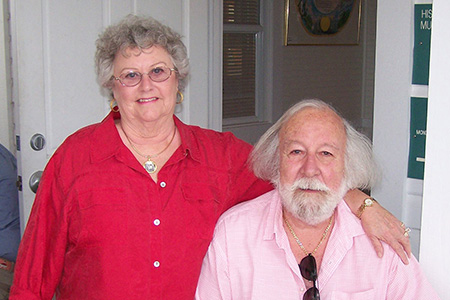 Robert and Roberta Johnson in pink and fuchsia shirts